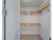 Large walk-in closet with wood shelving at 301 1St S St # 1604, St Petersburg, FL 33701