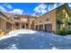 Grand estate with expansive driveway, three-car garage, and Mediterranean architecture at 7734 Still Lakes Dr, Odessa, FL 33556