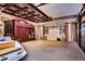 Spacious garage with custom cabinetry and ornate ceiling at 7734 Still Lakes Dr, Odessa, FL 33556