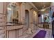 Large bathroom with and vanities and a walk-in shower at 7734 Still Lakes Dr, Odessa, FL 33556