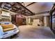 Luxury garage, custom storage, and decorative ceiling at 7734 Still Lakes Dr, Odessa, FL 33556