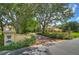 Elegant home entrance with landscaped drive at 7734 Still Lakes Dr, Odessa, FL 33556