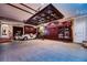 Extravagant garage featuring a unique ceiling design and ample storage at 7734 Still Lakes Dr, Odessa, FL 33556