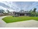 Spacious backyard with pool and large lawn at 108 Laurel Tree Way, Brandon, FL 33511