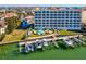 Beautiful waterfront condo with private boat docks and a community pool surrounded by lush landscaping at 17745 Gulf Blvd # 604, Redington Shores, FL 33708