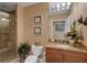 Cozy bathroom featuring granite countertops, a glass shower, and stylish decor at 17745 Gulf Blvd # 604, Redington Shores, FL 33708