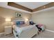 Comfortable bedroom with patriotic bedding and decor and plenty of natural light at 17745 Gulf Blvd # 604, Redington Shores, FL 33708