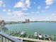 Expansive water view of the marina and harbor with boat docks on a bright, sunny day at 17745 Gulf Blvd # 604, Redington Shores, FL 33708