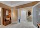 Inviting hallway features a charming hall tree with bench seating and a decorative console table at 17745 Gulf Blvd # 604, Redington Shores, FL 33708