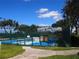 Well maintained pickleball courts with surrounding fence at 18833 Bent Pine Dr, Hudson, FL 34667