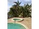 Relaxing pool and spa surrounded by lush landscaping at 2017 Iowa Ne Ave, St Petersburg, FL 33703