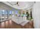 Relaxing living space with expansive lake views and access to a patio at 2905 Safe Harbor Dr, Tampa, FL 33618
