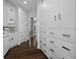 Hallway with built-in storage, with easy access to kitchenette and other rooms at 2905 Safe Harbor Dr, Tampa, FL 33618