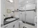 Bathroom with walk-in shower and modern vanity at 2905 Safe Harbor Dr, Tampa, FL 33618