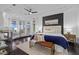 Main bedroom with fireplace, sitting area, and water views at 2905 Safe Harbor Dr, Tampa, FL 33618