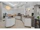Modern kitchen featuring granite countertops, stainless steel appliances, and luxury lighting at 2905 Safe Harbor Dr, Tampa, FL 33618