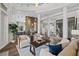 Bright, open-concept living room featuring hardwood floors and designer furnishings at 2905 Safe Harbor Dr, Tampa, FL 33618