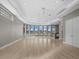 Spacious living room with water view from oversized windows at 2905 Safe Harbor Dr, Tampa, FL 33618