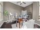 Inviting home office features hardwood floors and multiple windows at 2905 Safe Harbor Dr, Tampa, FL 33618