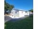 Updated exterior of a single-Gathering home with landscaping at 3751 67Th N Ave, Pinellas Park, FL 33781