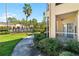 Walkway leads to a community pool and clubhouse at 5125 Palm Springs Blvd # 10110, Tampa, FL 33647