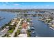 Stunning aerial shot of a waterfront community, showing the home's ideal location with easy access to the sea at 7949 2Nd S Ave, St Petersburg, FL 33707