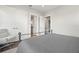 Bedroom featuring neutral walls and access to an ensuite and walk-in closet at 7949 2Nd S Ave, St Petersburg, FL 33707