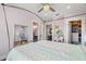 Bedroom view showcasing ensuite bathroom, living area, and closet at 7949 2Nd S Ave, St Petersburg, FL 33707