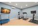 This home gym has an assortment of exercise equipment at 7949 2Nd S Ave, St Petersburg, FL 33707