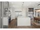 Bright open floorplan featuring a modern kitchen, dining area, and living area at 7949 2Nd S Ave, St Petersburg, FL 33707