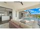 Beautiful outdoor living space featuring a pool, patio furniture, and seamless indoor-outdoor flow at 7949 2Nd S Ave, St Petersburg, FL 33707