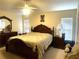 Main bedroom with king-size bed and ample closet space at 18833 Bent Pine Dr, Hudson, FL 34667