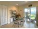 Breakfast nook with sliding glass doors leading to patio at 18833 Bent Pine Dr, Hudson, FL 34667