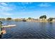 Scenic view of a peaceful canal with waterfront homes at 5311 Boardwalk St, Holiday, FL 34690