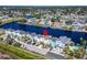 Aerial view of waterfront home with private dock at 5311 Boardwalk St, Holiday, FL 34690