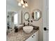 Modern bathroom with granite countertop and vessel sink at 5311 Boardwalk St, Holiday, FL 34690