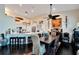 Spacious dining area with dark wood table and chairs, adjacent to the kitchen at 5311 Boardwalk St, Holiday, FL 34690