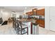 Modern kitchen with granite countertops and stainless steel appliances at 14929 Promenade Pkwy, Odessa, FL 33556