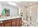 Bathroom boasts double vanity, shower, and updated fixtures at 14929 Promenade Pkwy, Odessa, FL 33556