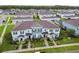 Aerial view of townhome with surrounding community at 14929 Promenade Pkwy, Odessa, FL 33556