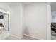 Neutral-toned hallway with carpet and access to bedrooms at 14929 Promenade Pkwy, Odessa, FL 33556