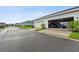 Attached garage with additional storage space at 14929 Promenade Pkwy, Odessa, FL 33556
