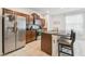 Well-equipped kitchen featuring stainless steel appliances and wood cabinets at 14929 Promenade Pkwy, Odessa, FL 33556