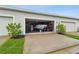 Garage with space for car, boat, and storage at 14929 Promenade Pkwy, Odessa, FL 33556