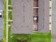 Aerial view of townhouses with private patios and lush landscaping at 14929 Promenade Pkwy, Odessa, FL 33556
