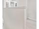Simple hallway with carpeted floors and neutral walls at 14929 Promenade Pkwy, Odessa, FL 33556