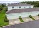 Three-car garage with ample parking space at 14929 Promenade Pkwy, Odessa, FL 33556