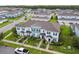 Aerial view of townhome with surrounding community at 14929 Promenade Pkwy, Odessa, FL 33556