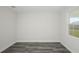Bright home office features wood-look flooring and large window at 10341 Fieldstone Myrtle Way, San Antonio, FL 33576