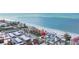 Aerial view of beachfront home and neighborhood at 19718 Gulf Blvd, Indian Shores, FL 33785